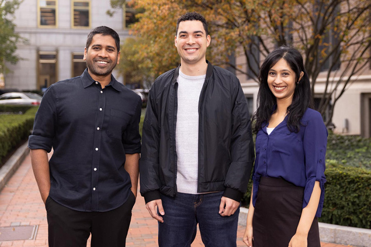 Portrait of, from left, Kalyan Veeramachaneni, Andrew Montanez, and Neha Patki outside.