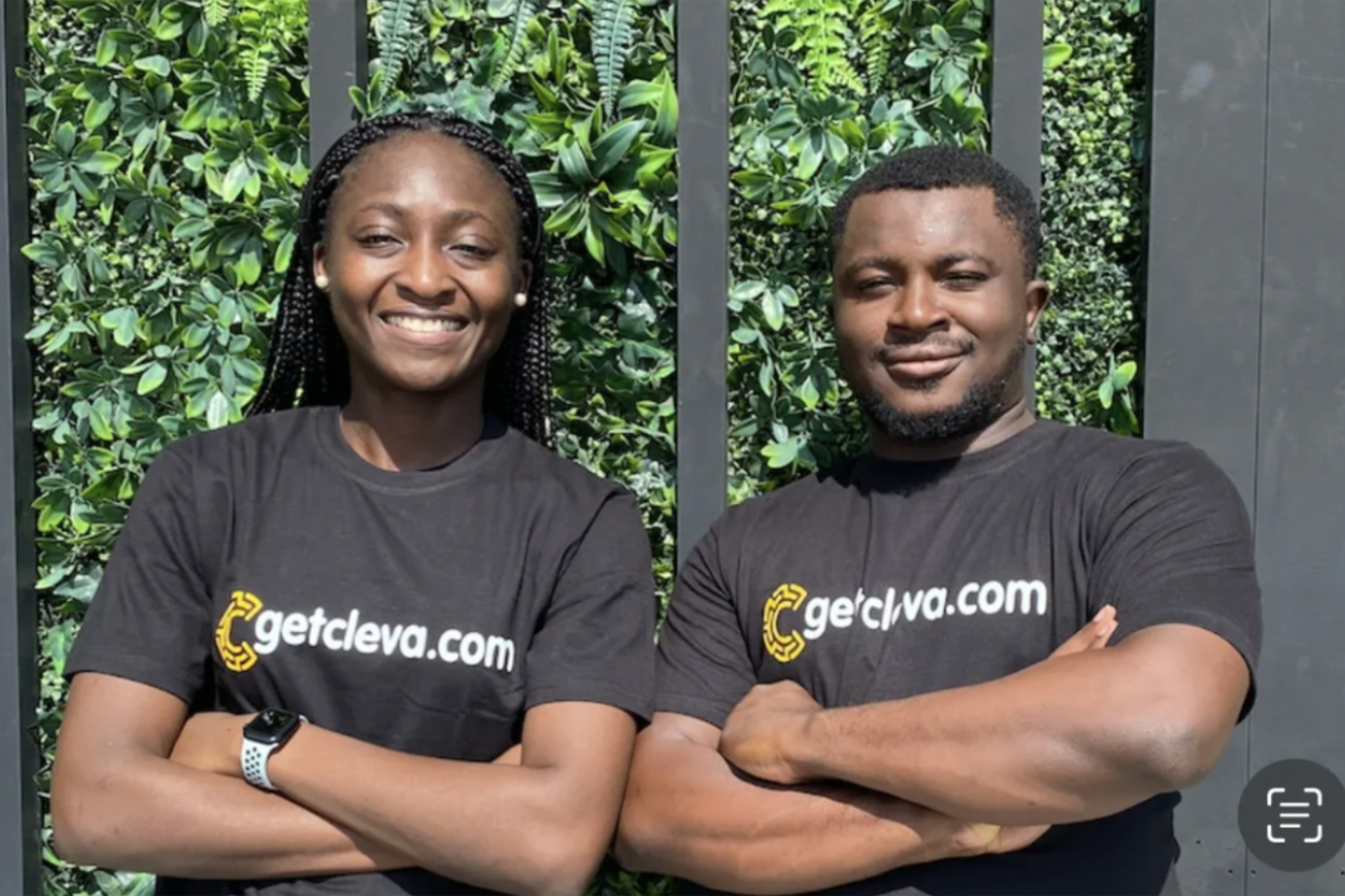 Cleva founders Tolu Alabi, left, and Philip Adama Abel ’15 stand side by side with arms folded wearing company T-shirts.