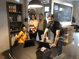 group of people working on computers 