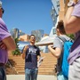 An MIT student speaks to a group on campus